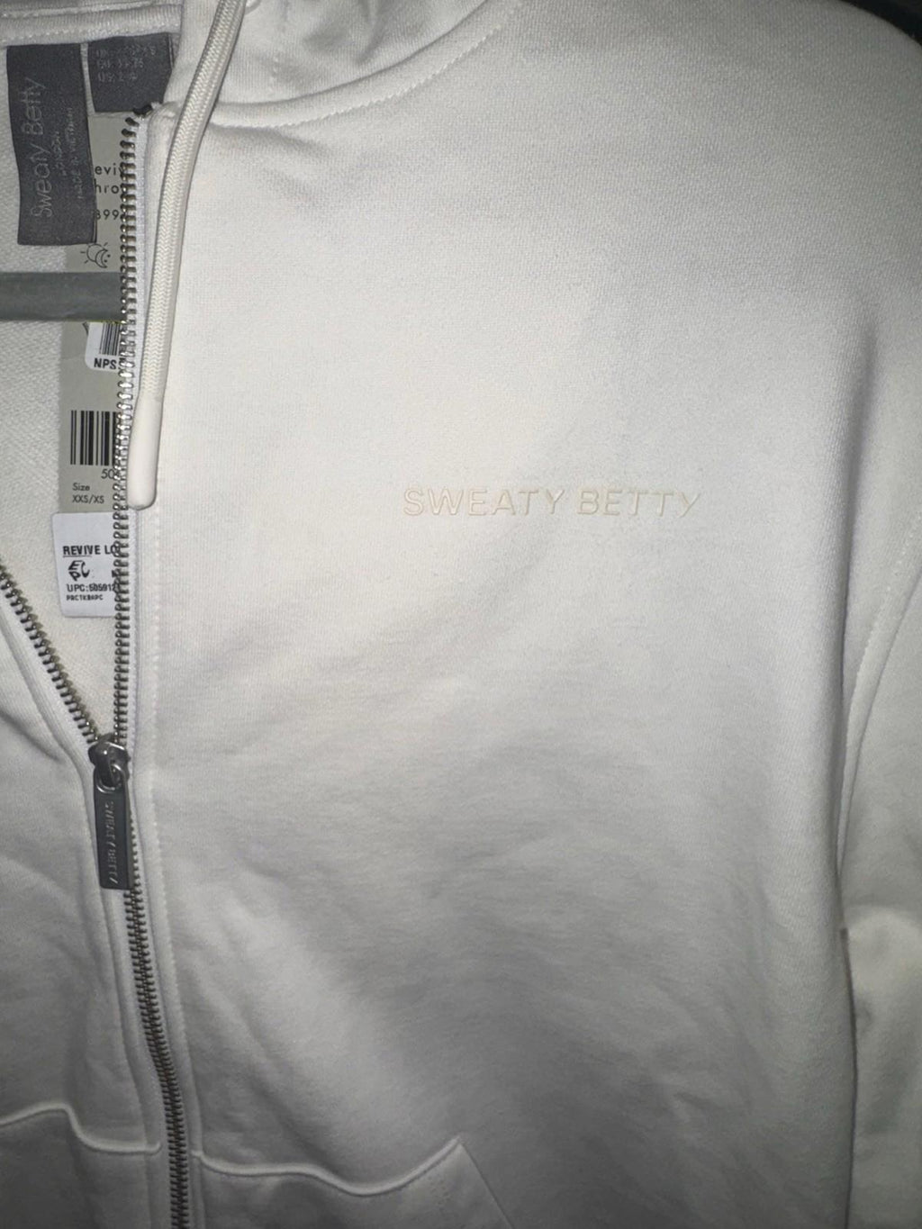 NWT Sweaty Betty Revive Zip Through Hoody in the Lily White color XS NEW!