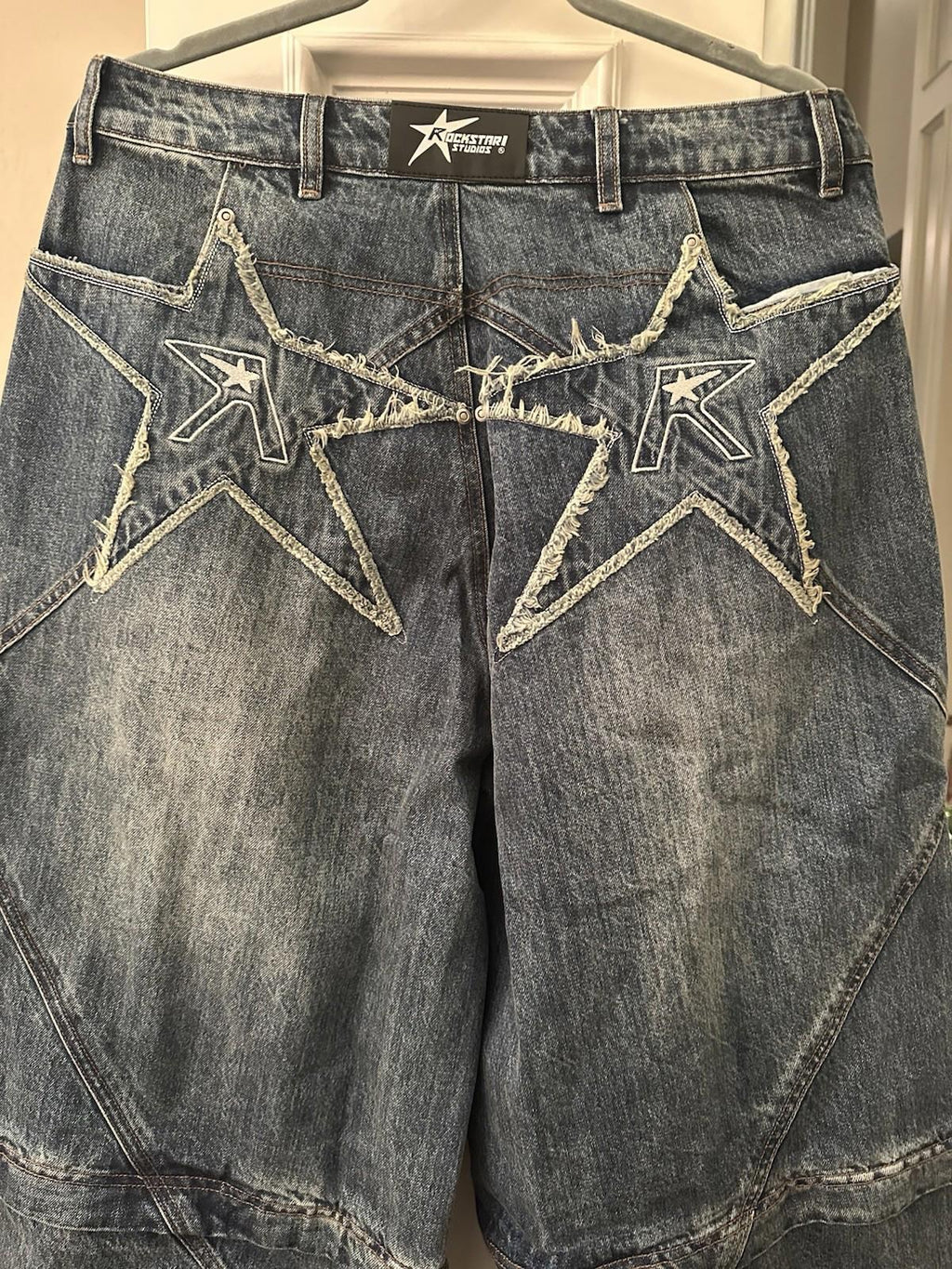 NEW! Rockstar Studios Logo pocket convertible jeans 34 X 32 NWOT
