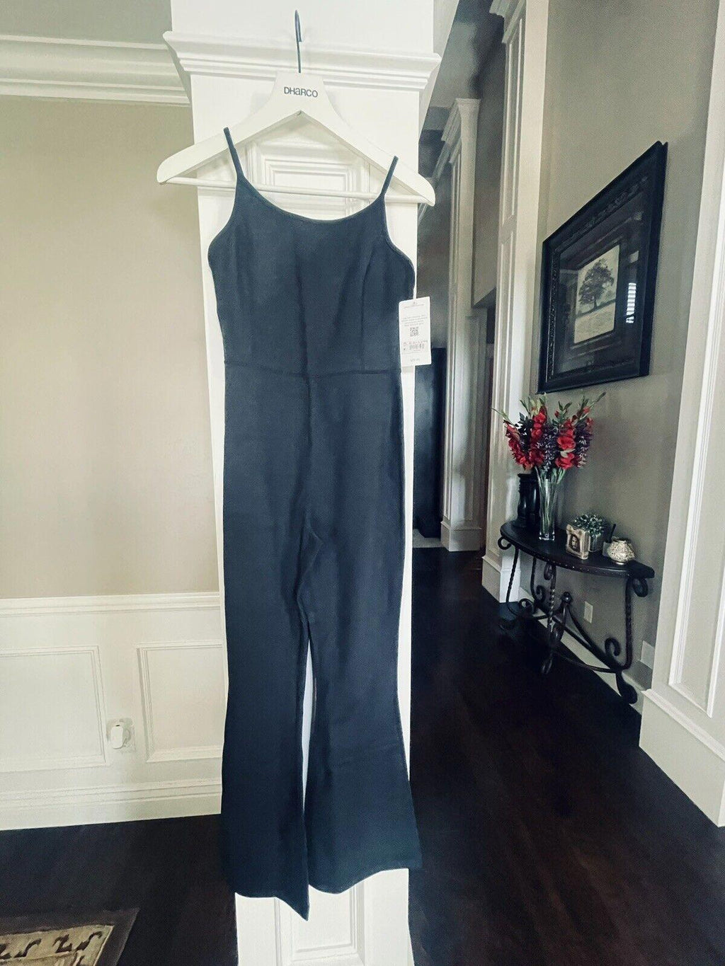 NWT- Altar’d State Black Long Flare leg Unitard. MSRP $98. A WARDROBE MUST HAVE!