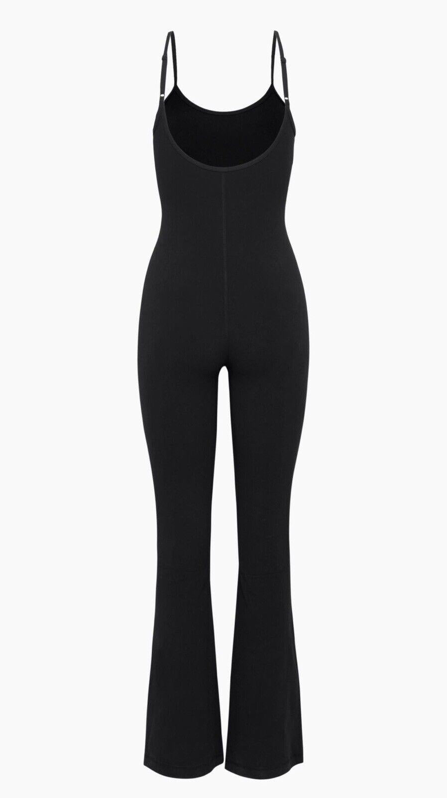 NWT- Altar’d State Black Long Flare leg Unitard. MSRP $98. A WARDROBE MUST HAVE!