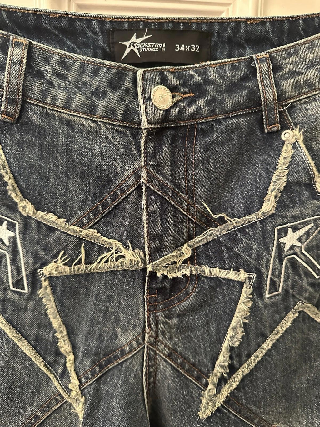 NEW! Rockstar Studios Logo pocket convertible jeans 34 X 32 NWOT