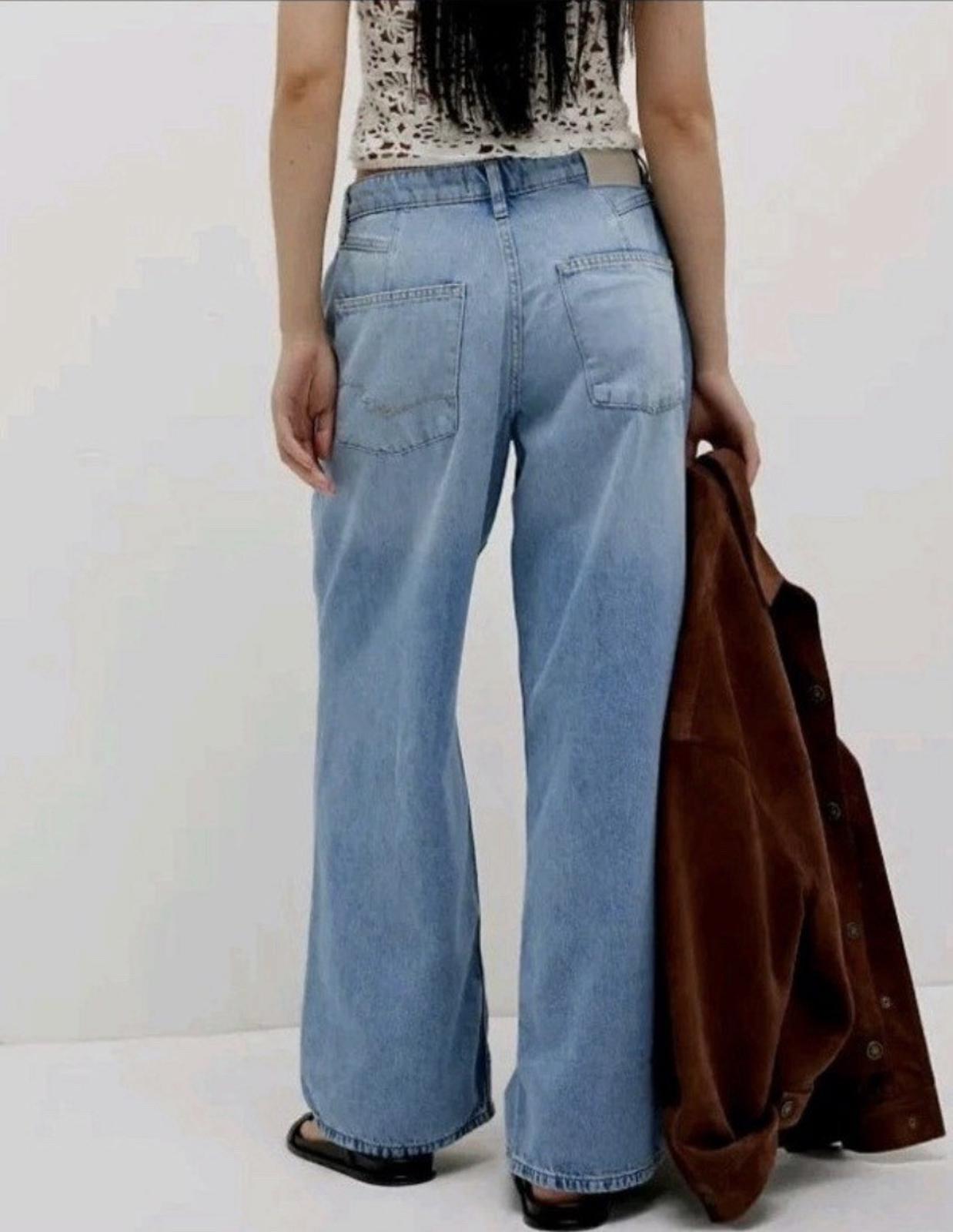 We The Free People Guessing Game Relaxed Leg Wide Leg Trousers Jeans Size 27 NEW